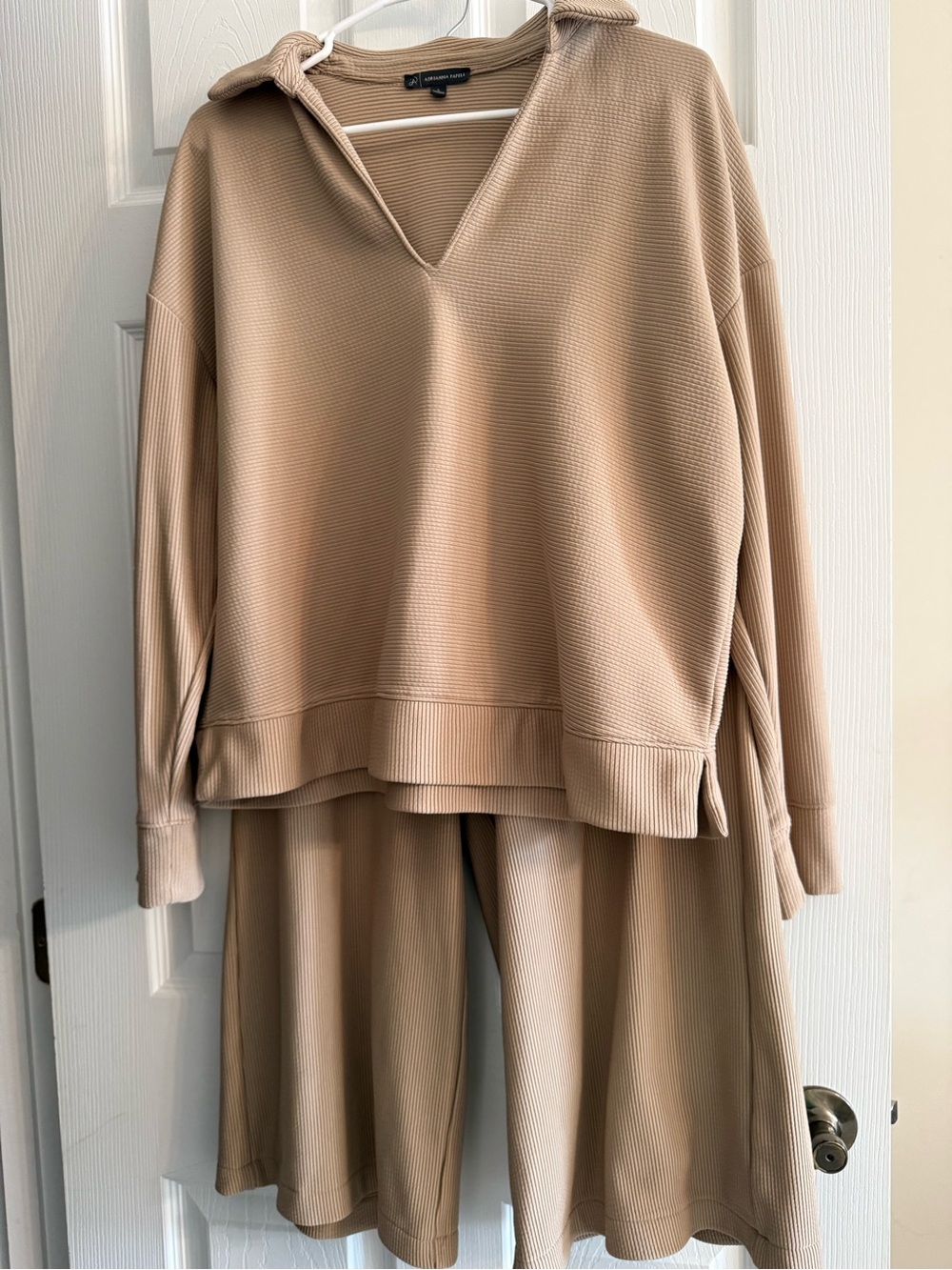 Adrianna Papell taupe two piece top and wide leg cropped pants.